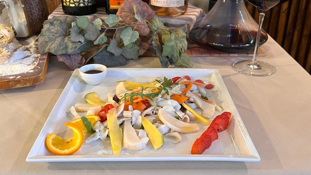 Hotel Il Cavaliere Nero ตีร์เรเนีย ภายนอก รูปภาพ